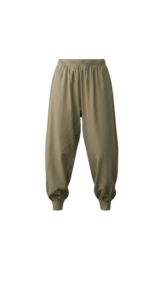 Night Suits By Aaka beige cotton hosiery harem pants with an elastic drawstring waistband and cuffed ankles.