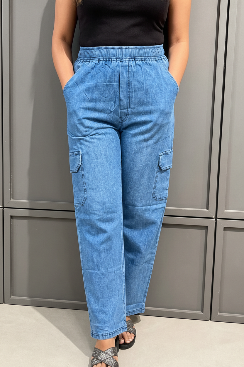 Close-up waist to ankle shot of blue denim cargo pant showing cargo pocket detail