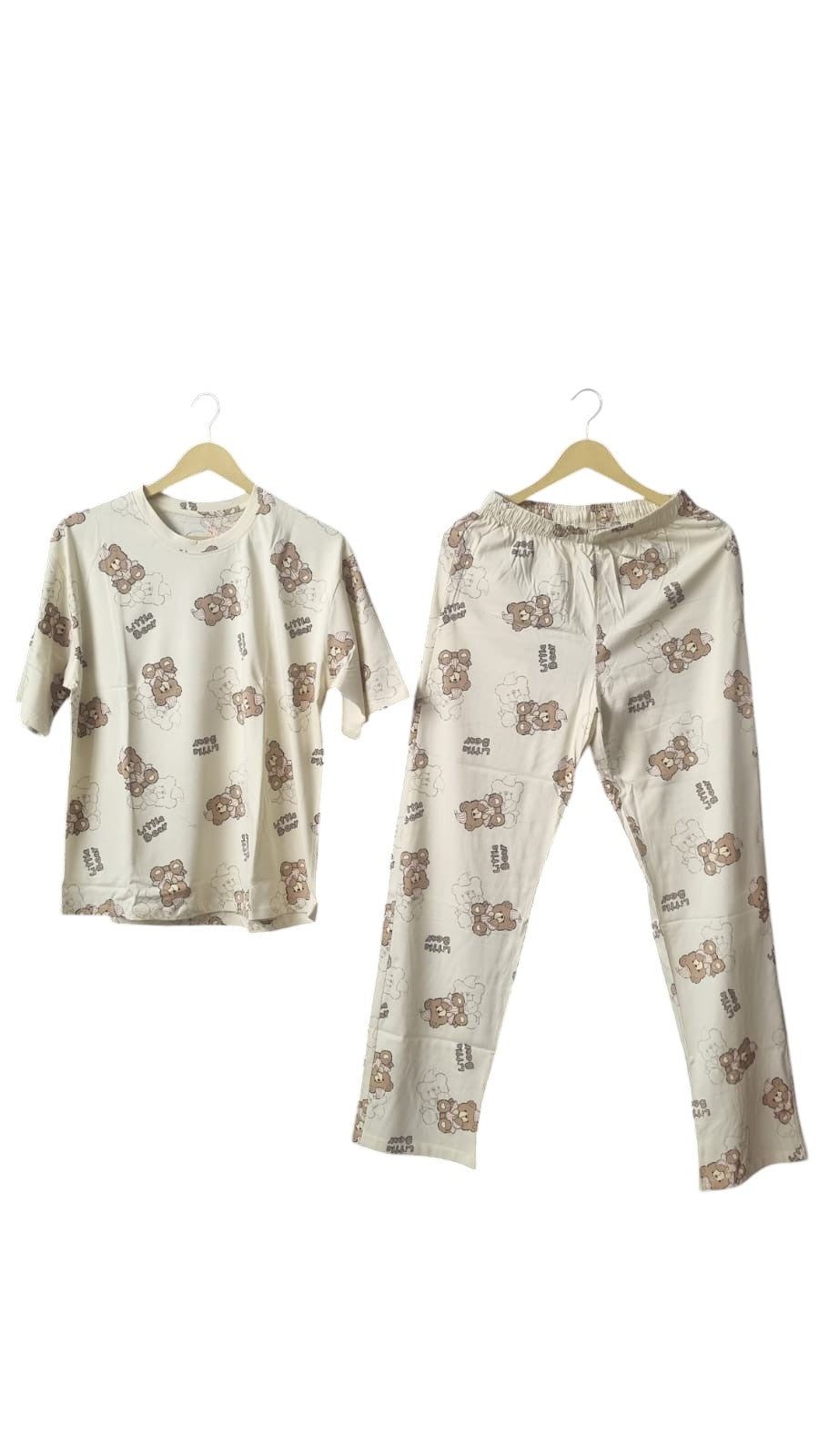 Night Suits By Aaka cream loungewear set with a whimsical brown bear print, featuring a crew neck top and trousers.